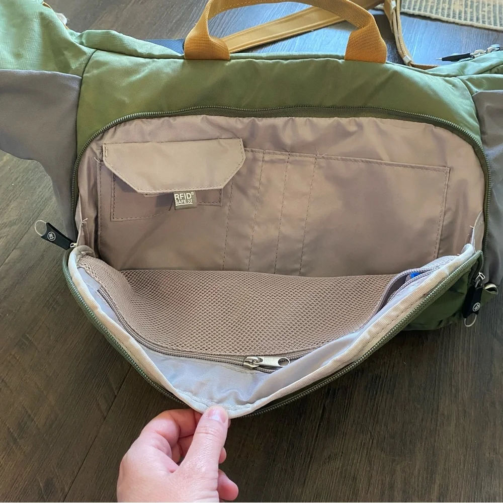 Pacsafe Olive Green and Mustard Yellow Crossbody Camera Bag